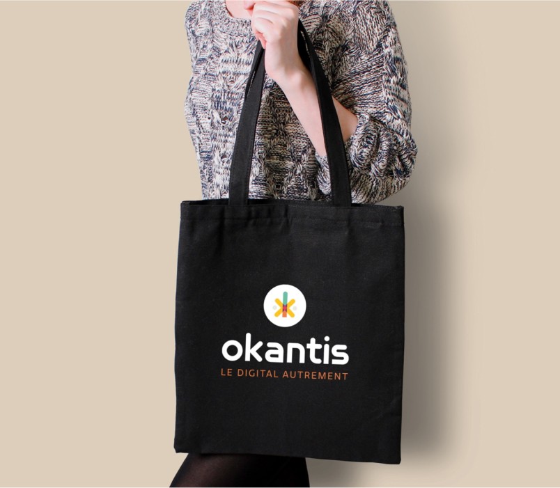 Agence Pixine : aperçu du logo Okantis sur un totebag